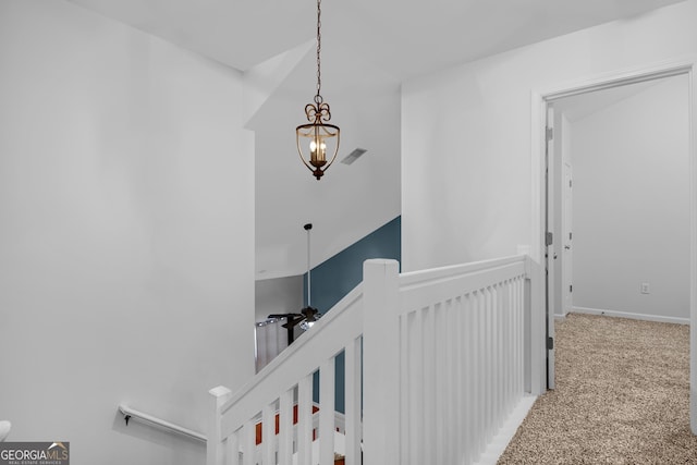 172 Sonata Cir, Pooler, GA 31322 - hallway with an upstairs landing, a chandelier, and carpet floors