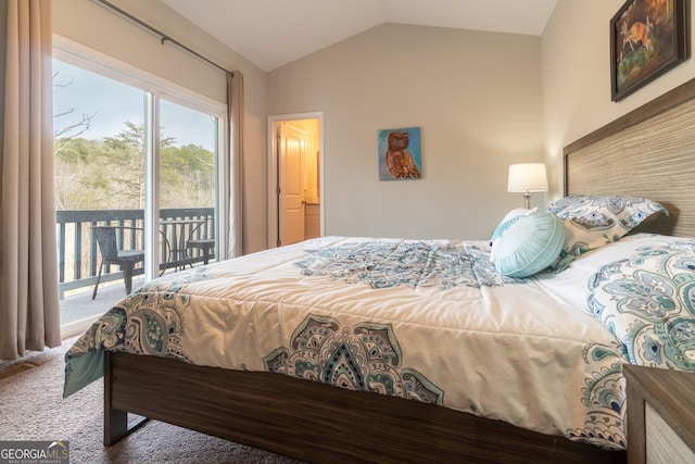 carpeted bedroom featuring access to exterior and vaulted ceiling