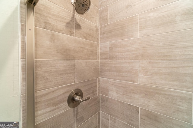 details featuring a tile shower