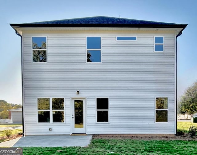 rear view of property with a patio