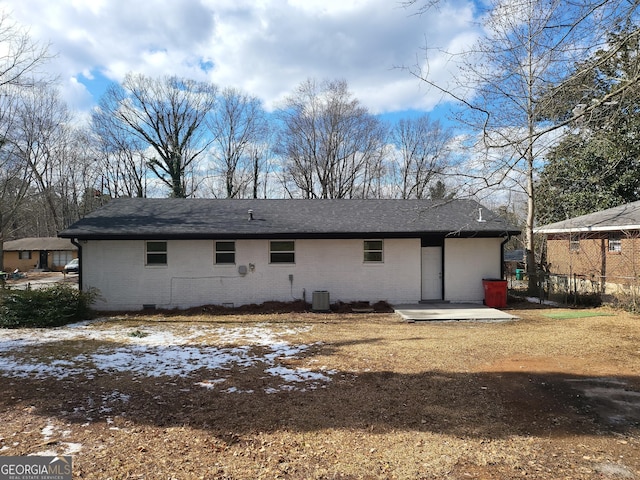 back of house with a patio area and central air condition unit