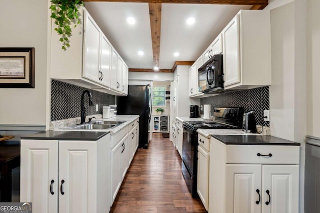 kitchen featuring sink, white cabinets, beam ceiling, and black appliances