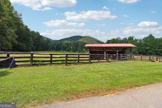 exterior space featuring a mountain view and a rural view