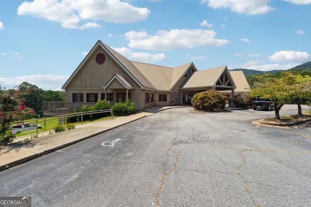 view of building exterior featuring a mountain view