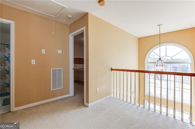 hallway featuring carpet