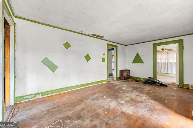 unfurnished living room with a textured ceiling