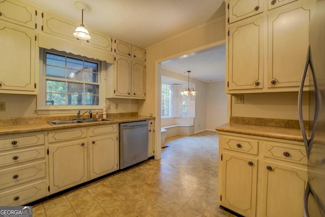 kitchen featuring pendant lighting, sink, plenty of natural light, and stainless steel appliances