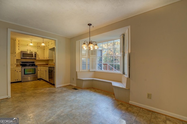 unfurnished dining area featuring a textured ceiling and a chandelier