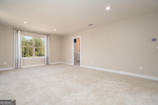 view of carpeted spare room