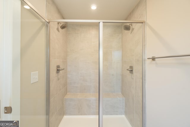 bathroom featuring an enclosed shower