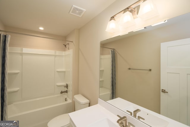 full bathroom featuring vanity, shower / tub combo with curtain, and toilet