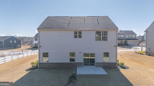 back of property featuring a patio area