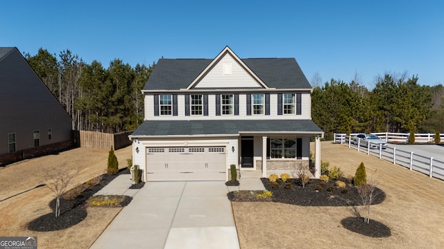 view of front of property with a garage