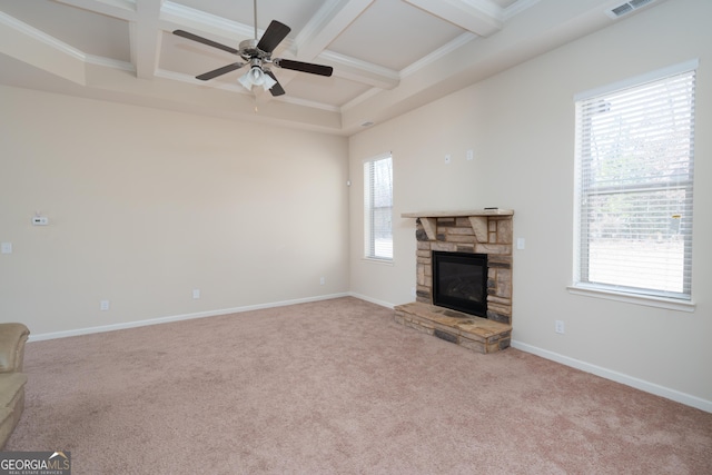 unfurnished living room with light colored carpet, coffered ceiling, and beam ceiling