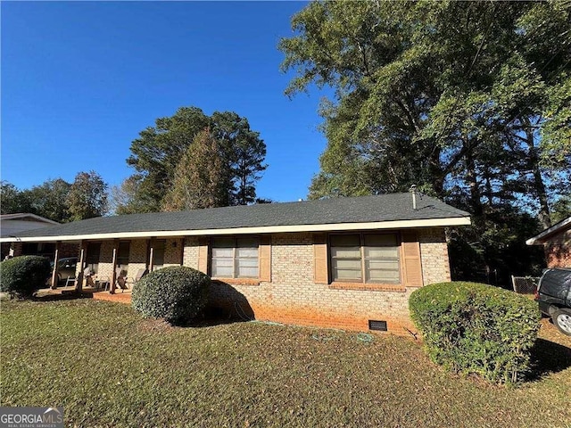 view of property exterior with a lawn