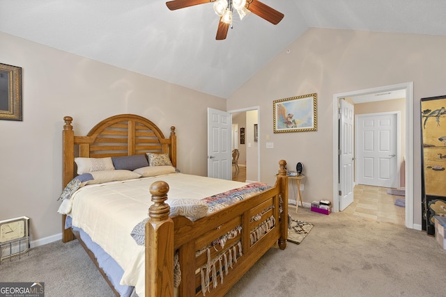 carpeted bedroom featuring lofted ceiling and ceiling fan