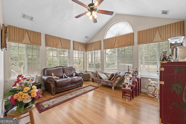 sunroom / solarium with vaulted ceiling and ceiling fan