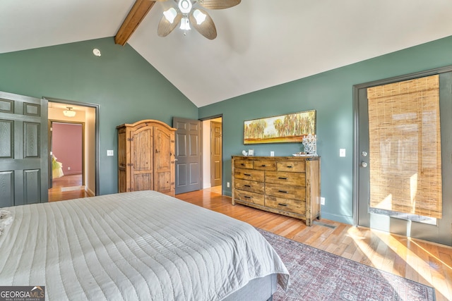 bedroom with ceiling fan, light hardwood / wood-style floors, and vaulted ceiling with beams