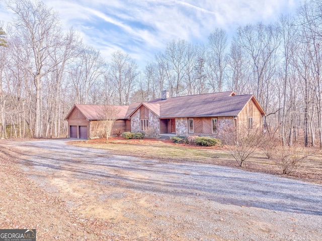 ranch-style home with a garage