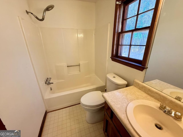 full bathroom featuring shower / bathtub combination, vanity, and toilet