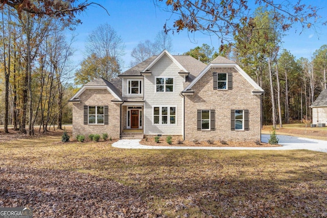 view of front of home with a front lawn