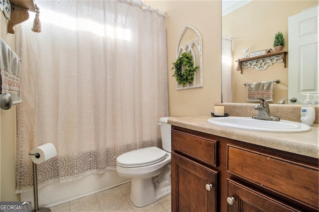 full bathroom featuring vanity, ornamental molding, shower / tub combo, and toilet