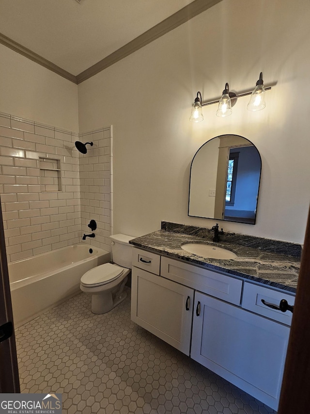 full bathroom featuring tiled shower / bath combo, crown molding, tile patterned floors, and vanity