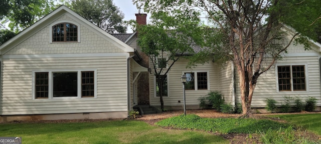 213 W Hightower Trl, Social Circle, GA 30025 - view of front of property with a chimney, a front yard, and crawl space