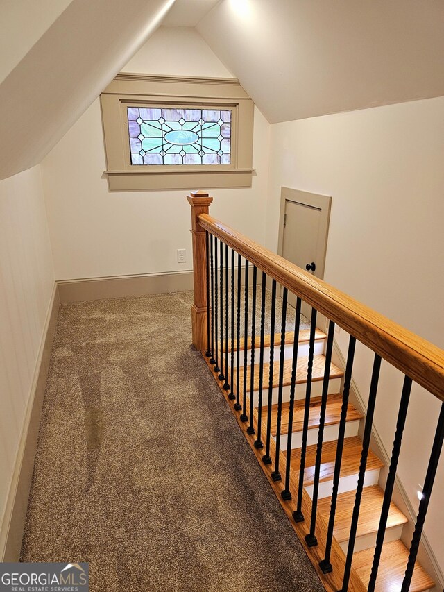 213 W Hightower Trl, Social Circle, GA 30025 - staircase with vaulted ceiling, baseboards, and carpet