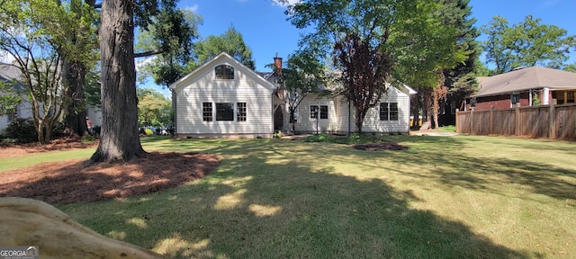 exterior space with a front lawn