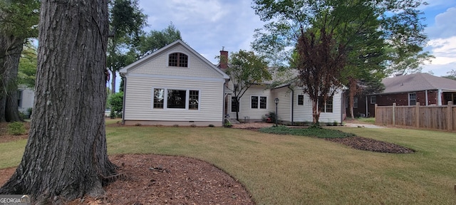 213 W Hightower Trl, Social Circle, GA 30025 - rear view of house featuring a chimney