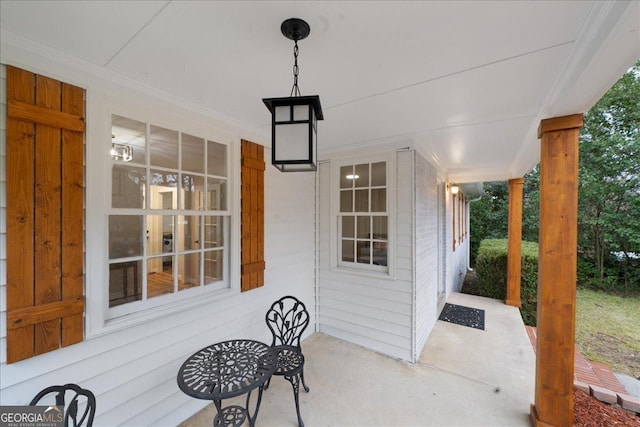 view of patio featuring a porch