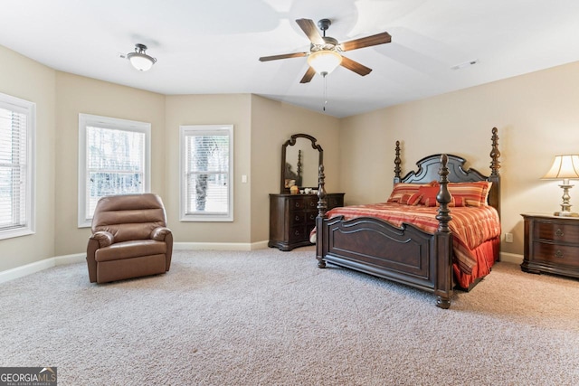 bedroom with light carpet and ceiling fan