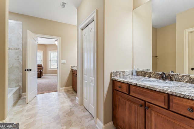 bathroom featuring vanity