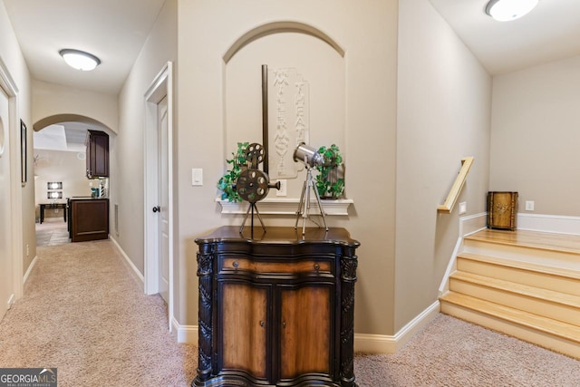 hallway with carpet