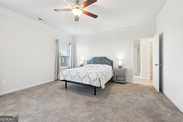 carpeted bedroom featuring ornamental molding and ceiling fan