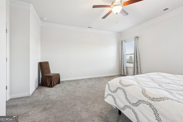 bedroom featuring crown molding, ceiling fan, and carpet flooring