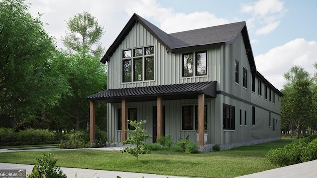 modern farmhouse style home featuring covered porch and a front yard