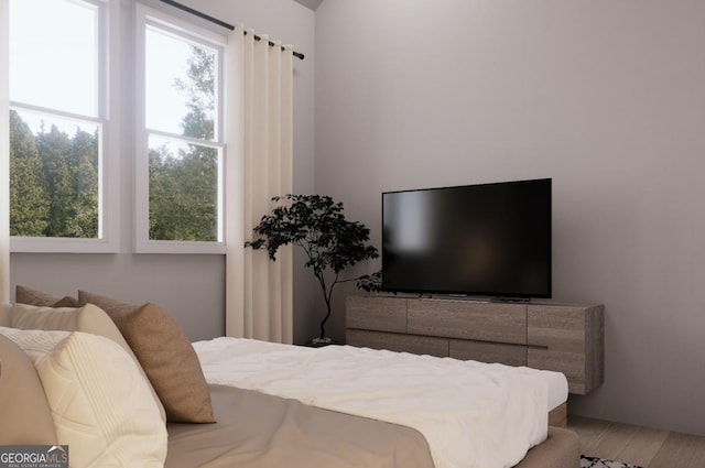 bedroom featuring hardwood / wood-style flooring