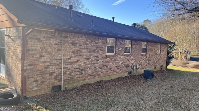 view of home's exterior featuring central AC unit