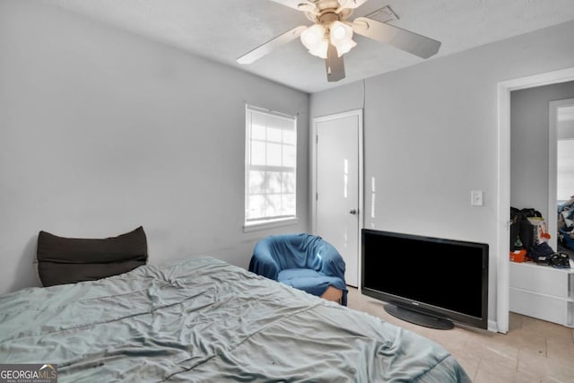 bedroom featuring ceiling fan