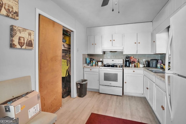 kitchen featuring white cabinetry, backsplash, white appliances, and light hardwood / wood-style flooring