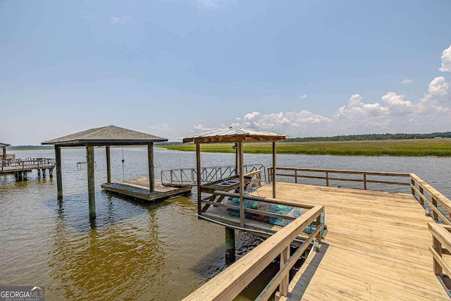 view of dock with a water view