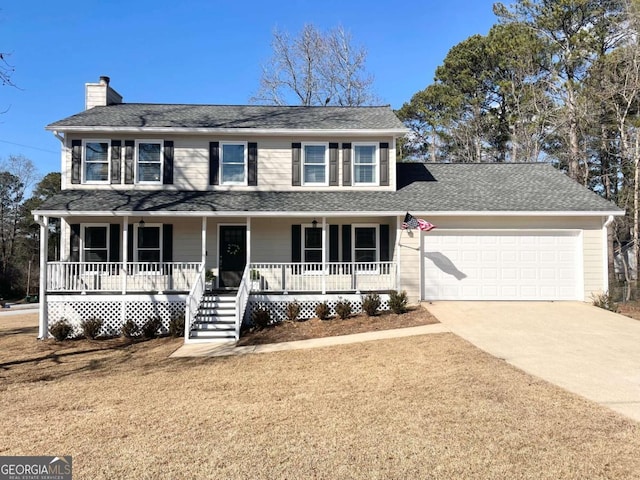 colonial home featuring a garage, covered porch, and a front lawn