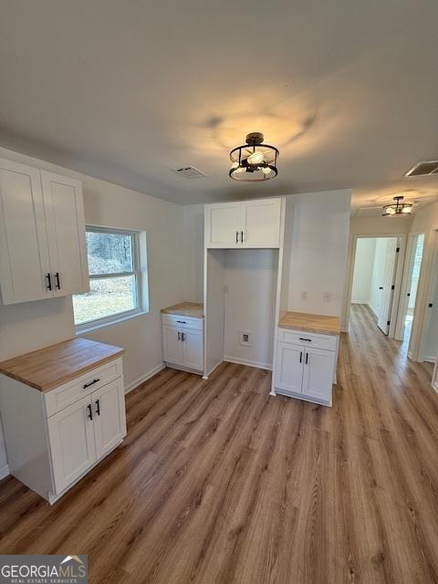 washroom featuring light hardwood / wood-style floors