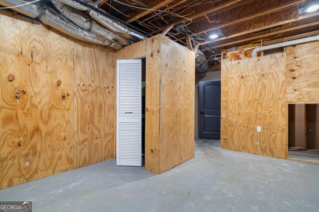 basement with wooden walls