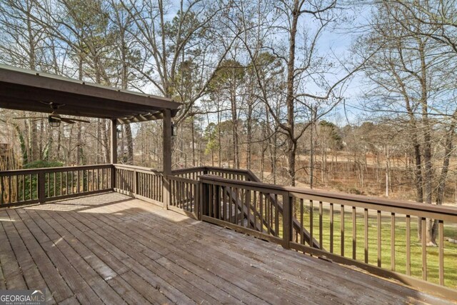 wooden deck with ceiling fan