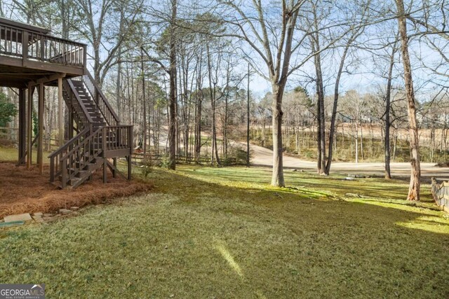 view of yard with a deck