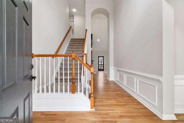 stairway featuring hardwood / wood-style flooring