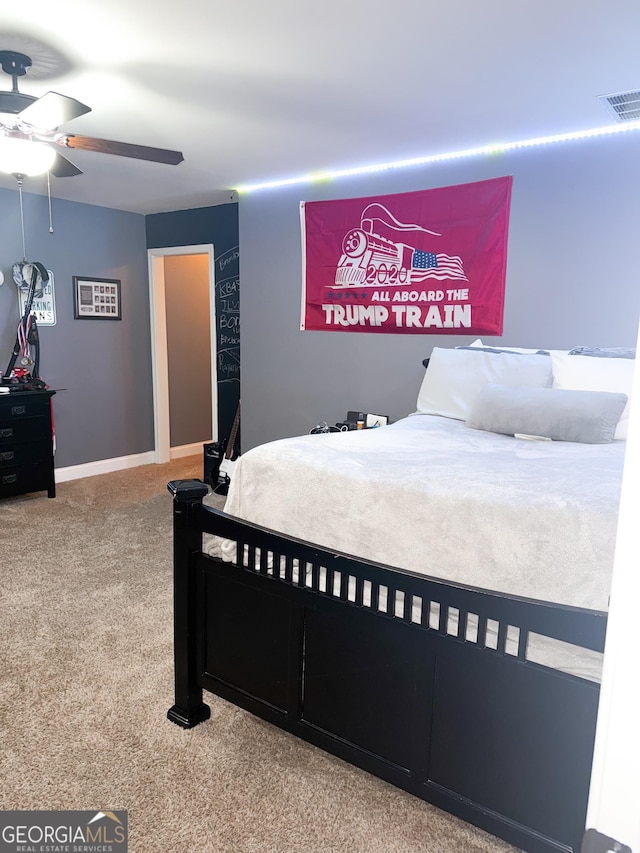 bedroom featuring ceiling fan and carpet flooring